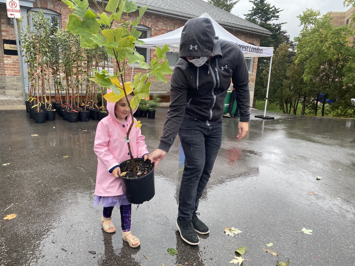 Father and Daughter visit the Neighbourhood Tree Depot.