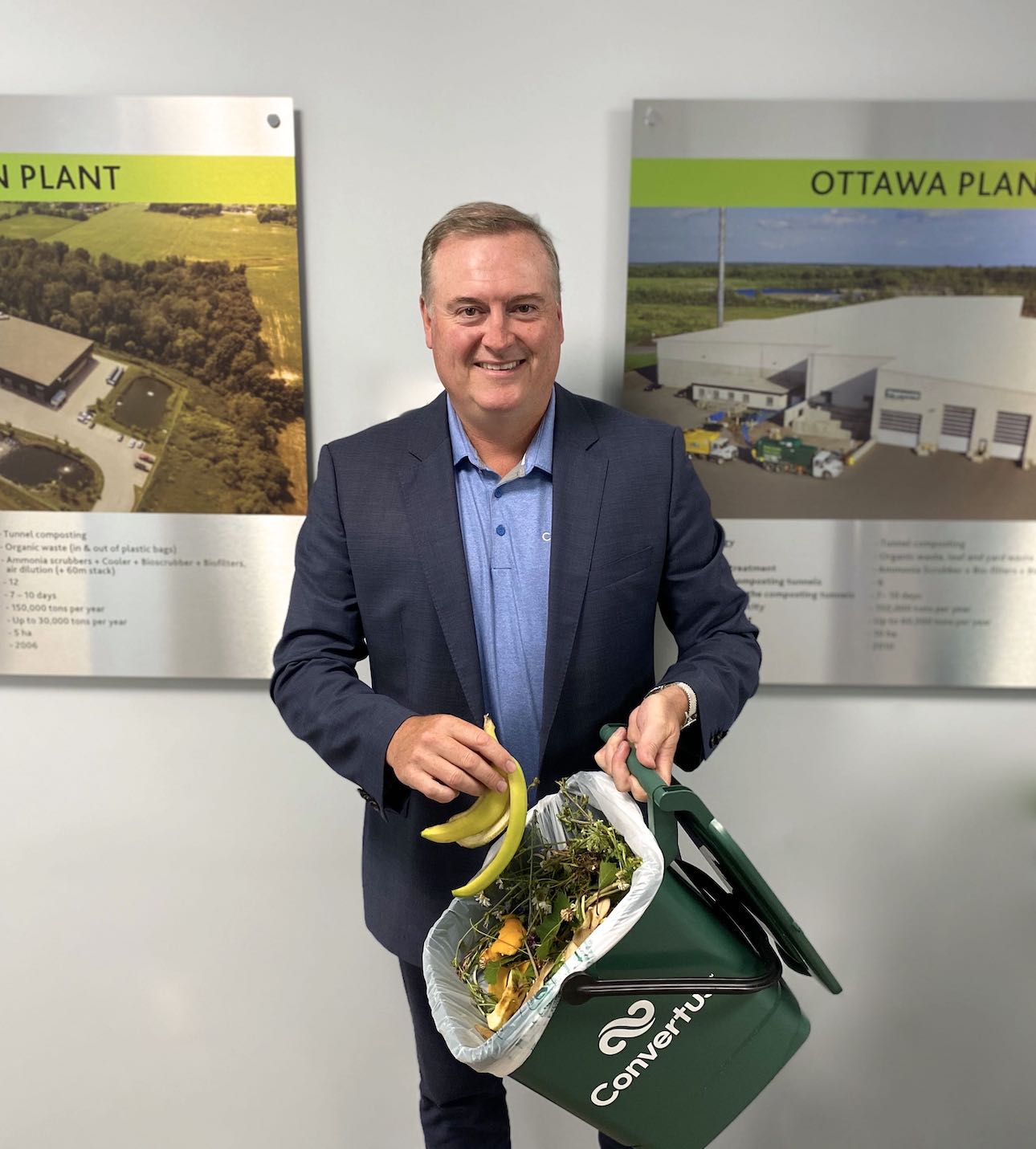 Michael Leopold Holding a Recycle Bin of Organic Waste